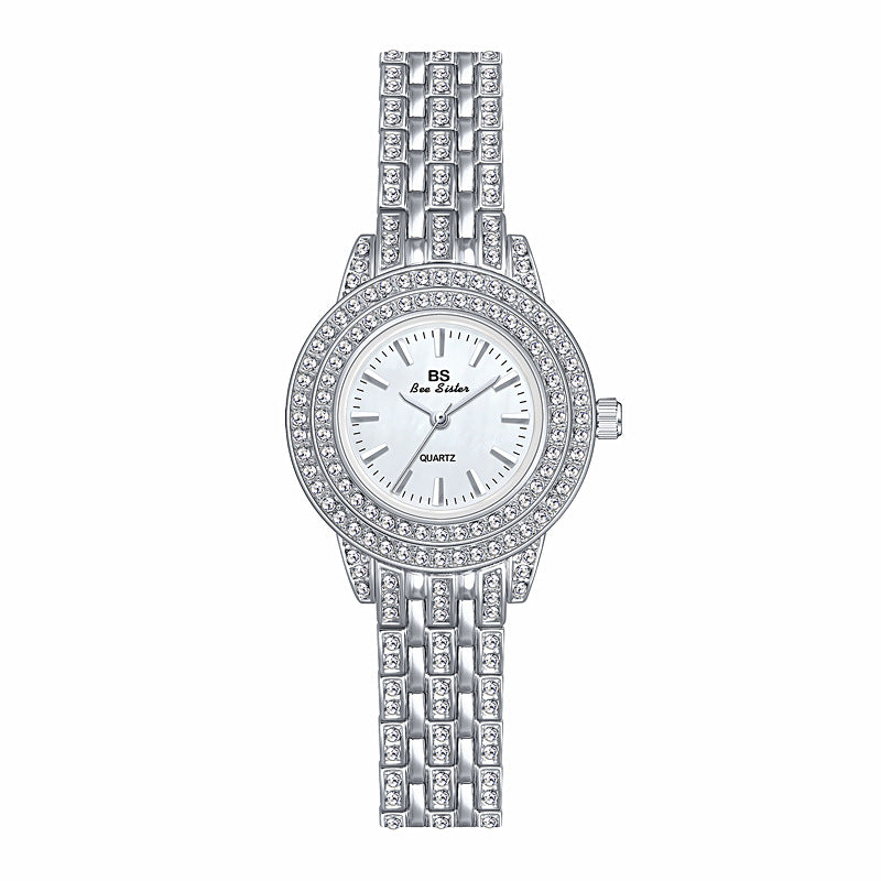 Montre de luxe pour femmes avec cadran en nacre et diamants