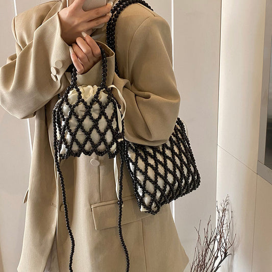 Sac à bandoulière tissé et perlé