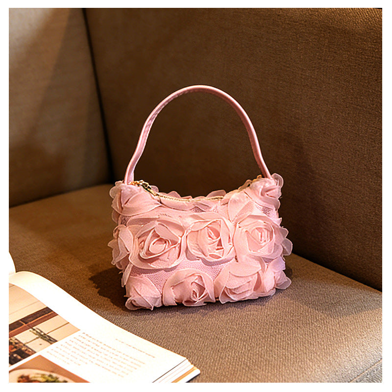Sac bandoulière de soirée en dentelle rose