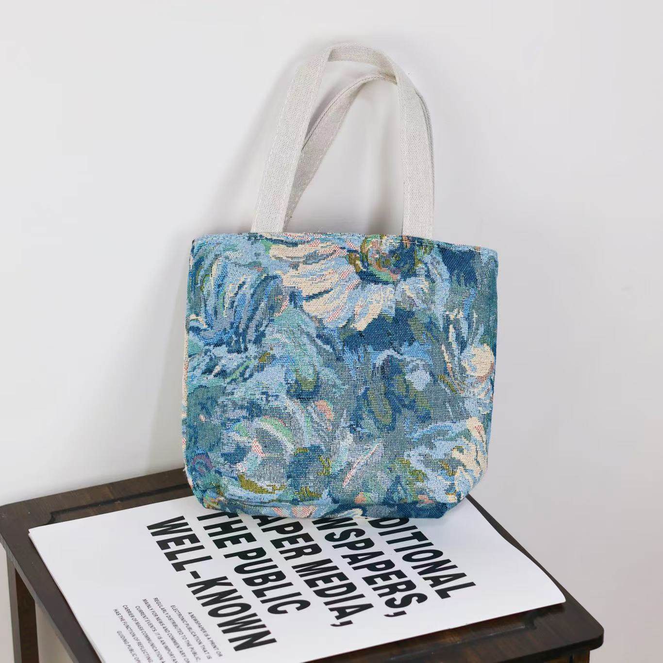 Sac à main en toile brodée double face