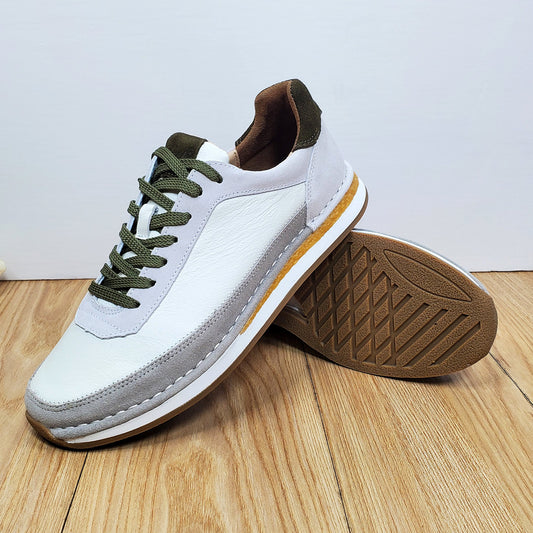 Chaussures décontractées pour hommes en cuir véritable, respirantes et confortables, à semelle plate.