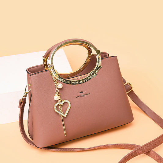 Sac seau tendance avec bandoulière ajustable