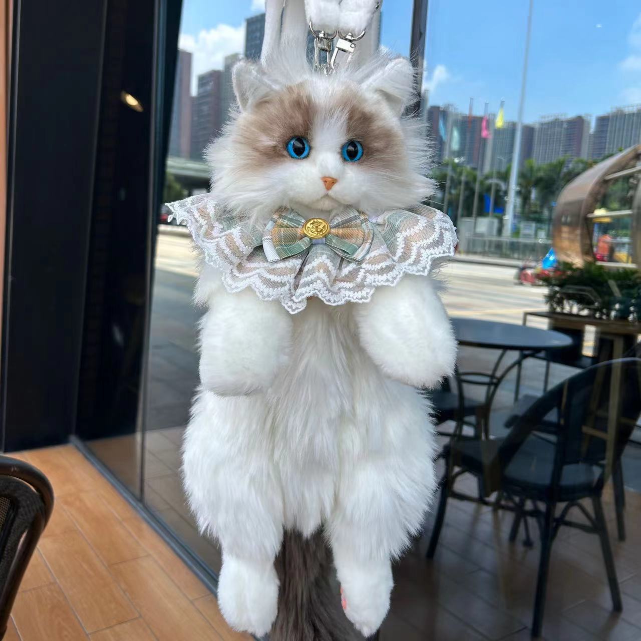 Sac à dos poupée chat en peluche