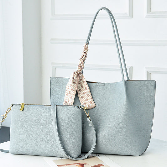 Sac bandoulière à pompons et perles tendance
