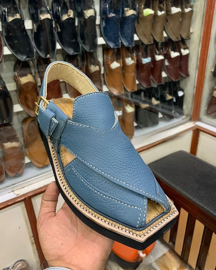 Sandales plates en cuir tressé