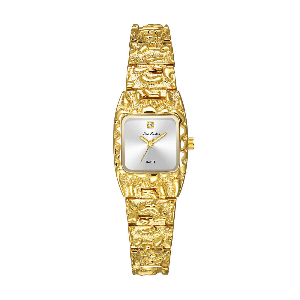 Montre quartz vintage pour femmes avec bracelet en alliage