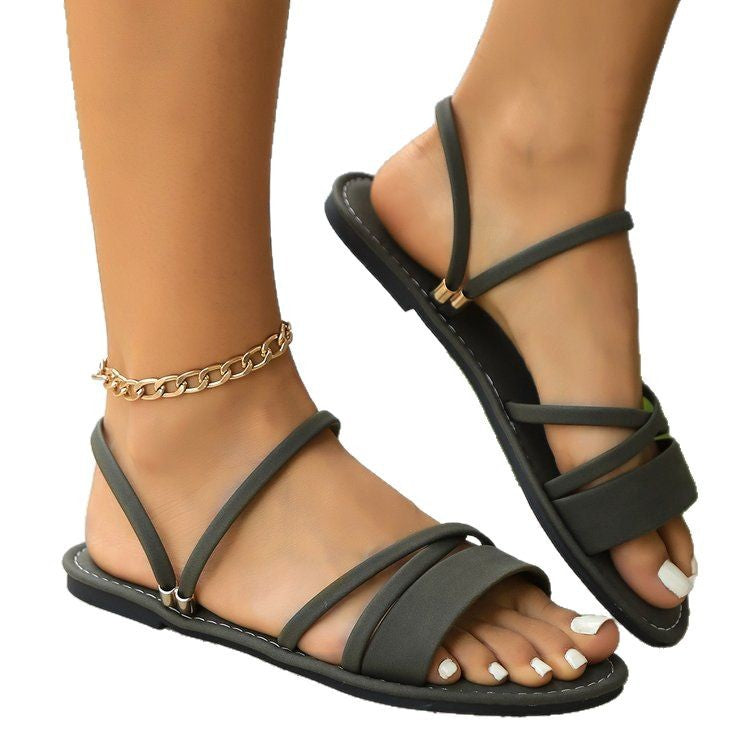 Chaussures plates pour femmes à sangle croisée