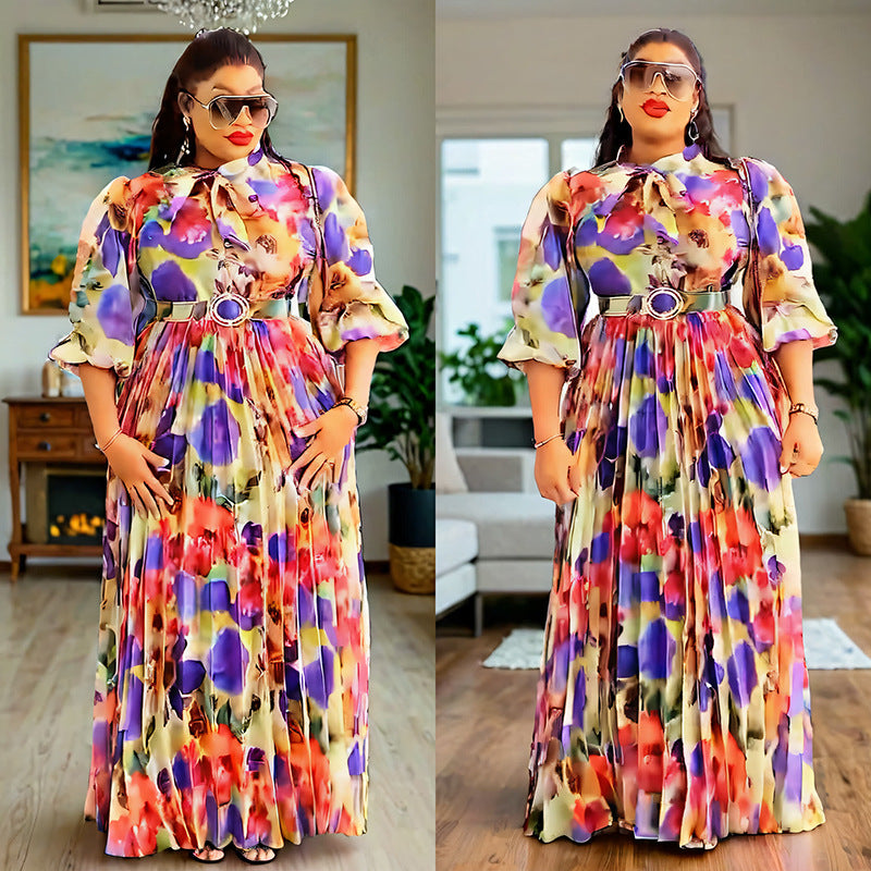 Habit :robe à col écharpe, manches bouffantes, imprimé à la taille, style affirmé