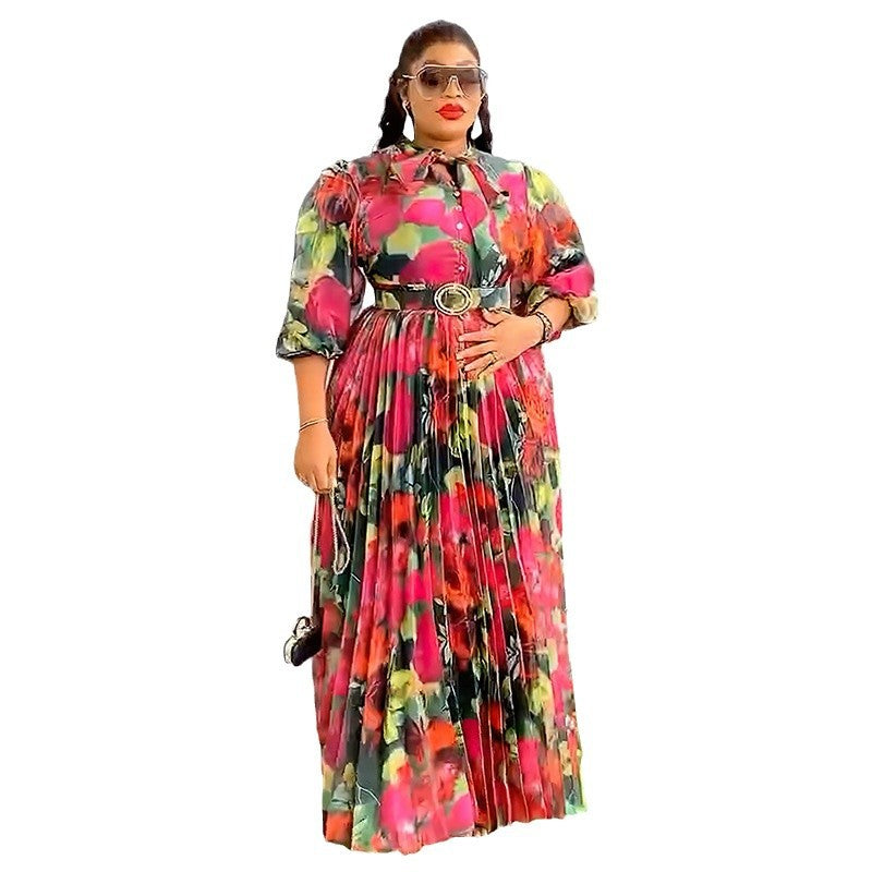 Habit :robe à col écharpe, manches bouffantes, imprimé à la taille, style affirmé