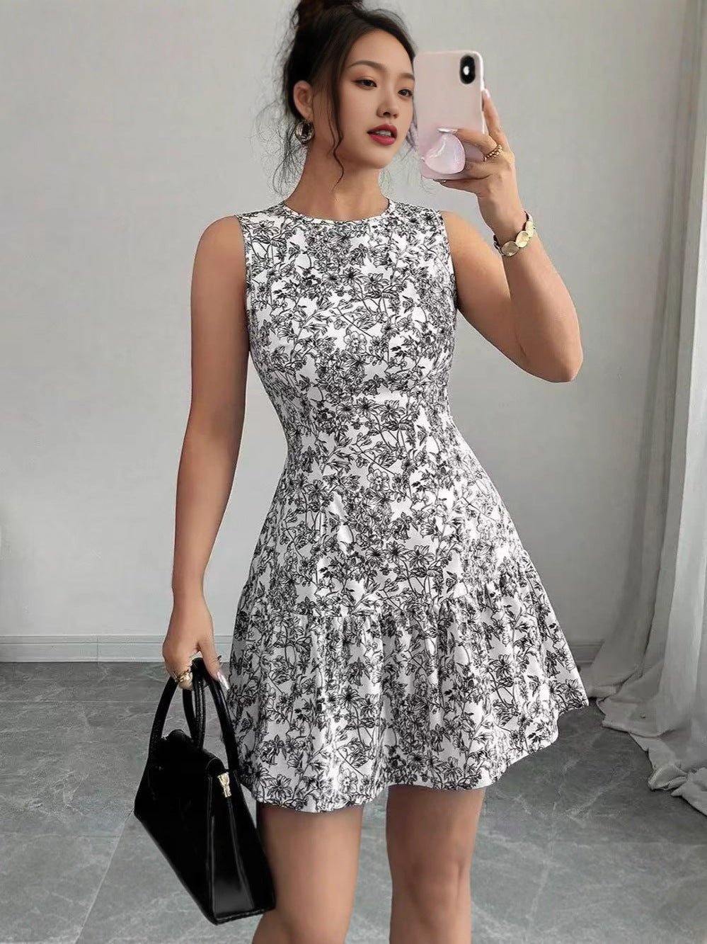 Robe à jupe en couche sans manches à imprimé floral