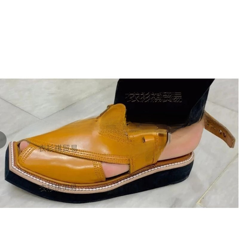 Sandales plates en cuir tressé
