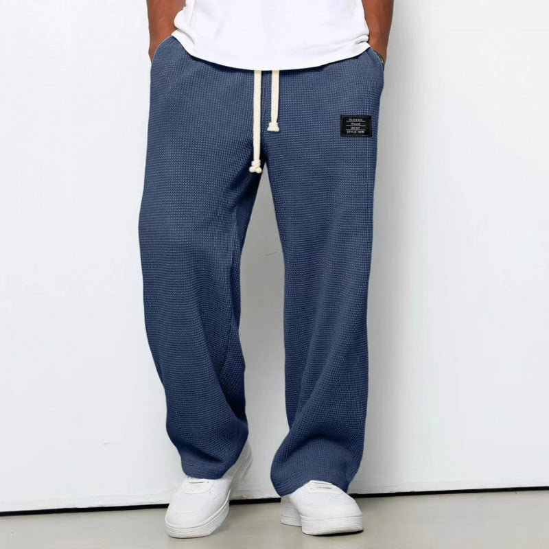 Pantalon décontracté à cordon de serrage en tissu gaufré pour homme