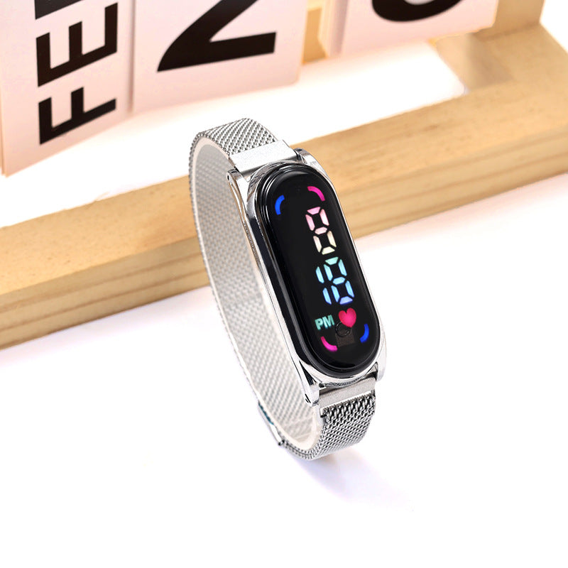 Montre électronique à LED avec lumières colorées et bracelet magnétique