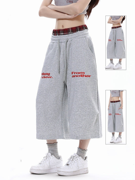 Pantalon court décontracté à carreaux patchwork et double taille