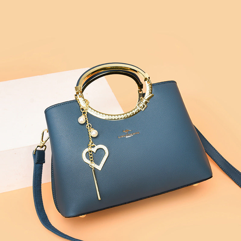Sac seau tendance avec bandoulière ajustable