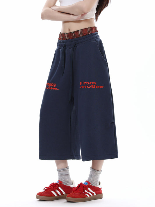 Pantalon court décontracté à carreaux patchwork et double taille