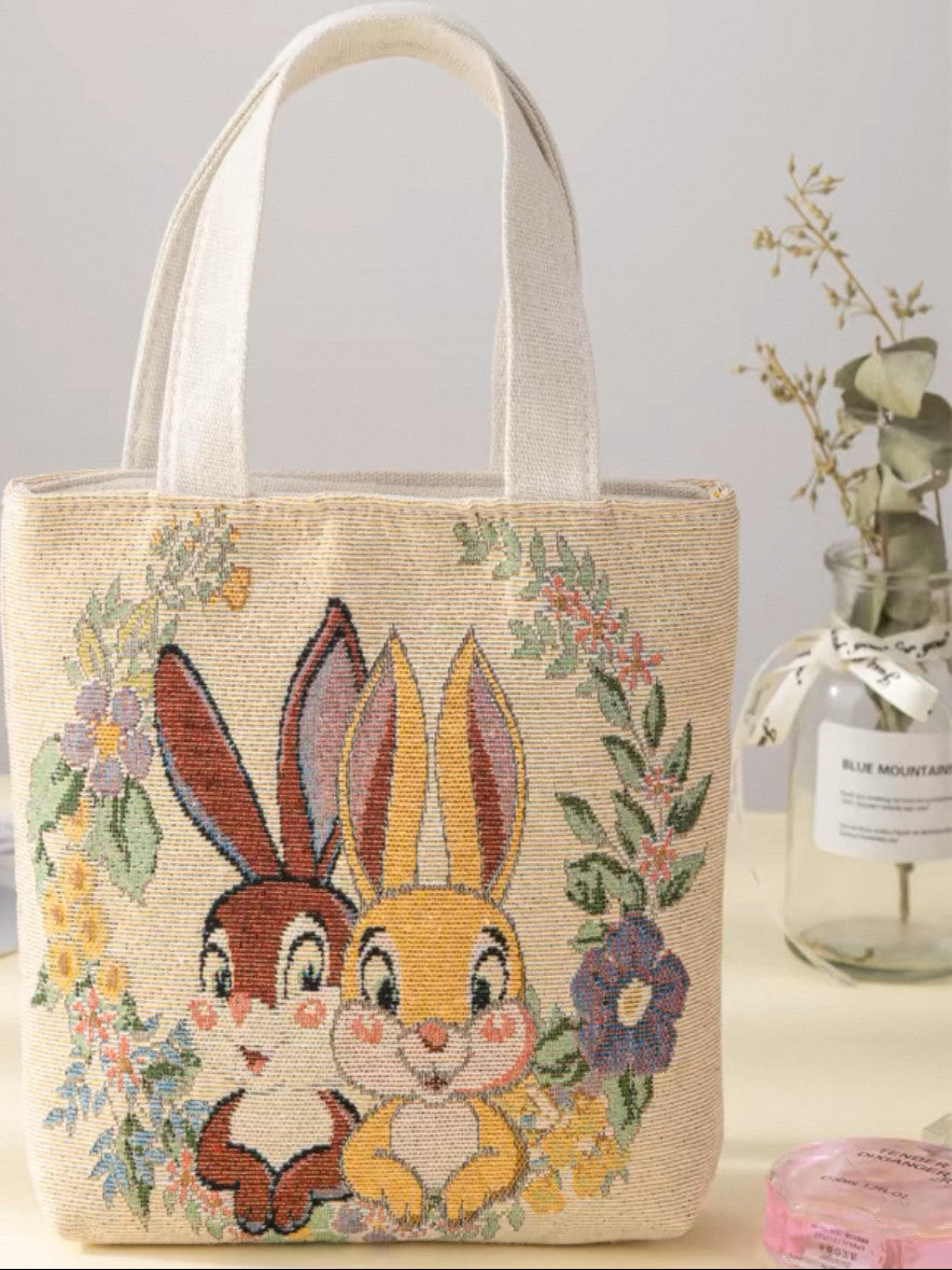 Sac à main en toile brodée double face