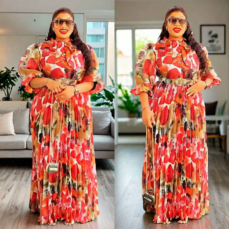 Habit :robe à col écharpe, manches bouffantes, imprimé à la taille, style affirmé