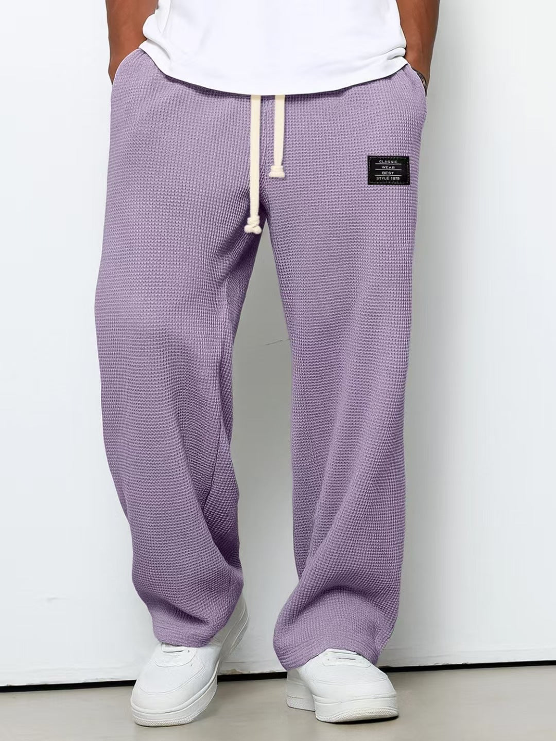 Pantalon décontracté à cordon de serrage en tissu gaufré pour homme