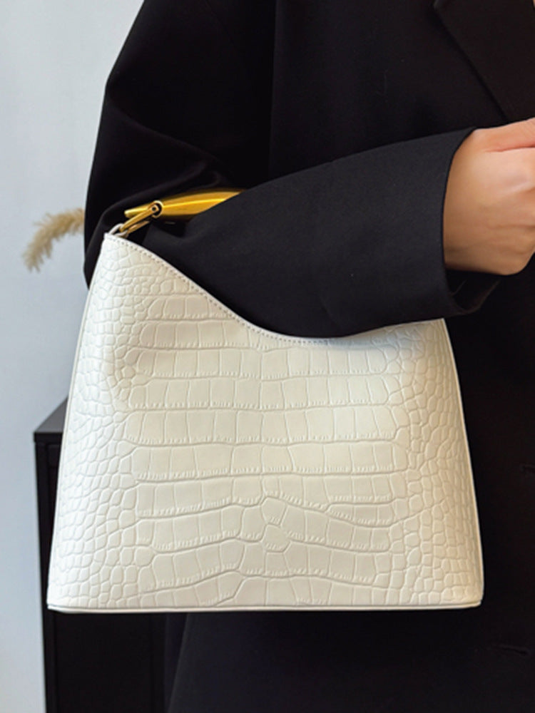 Sac seau à motif crocodile texturé