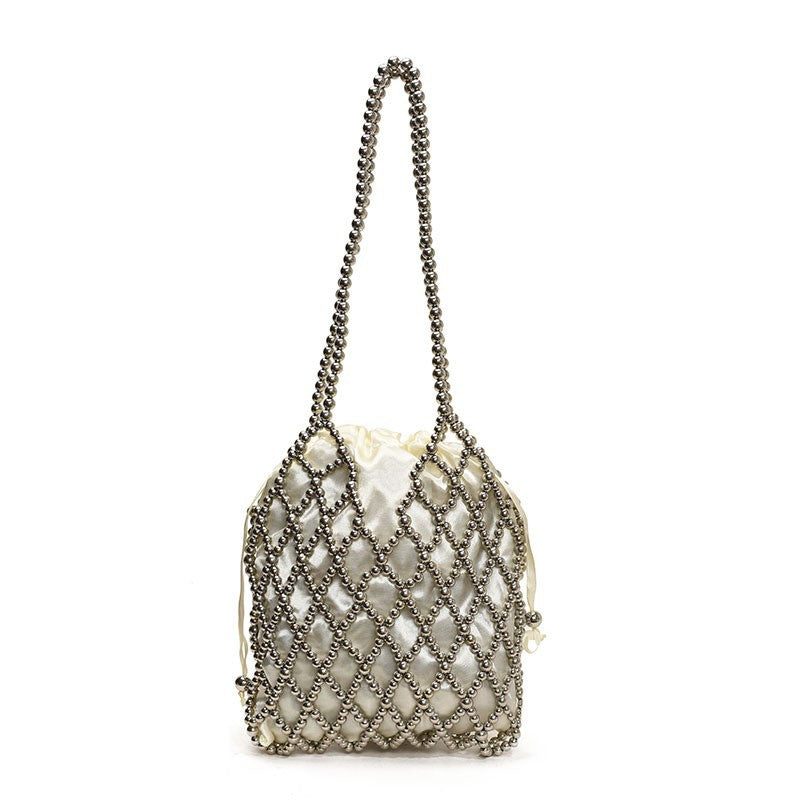Sac à bandoulière tissé et perlé