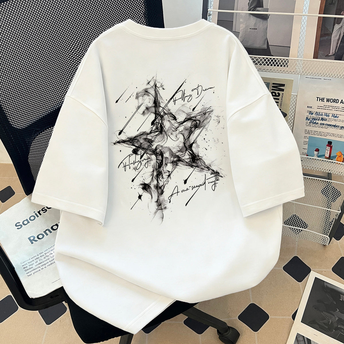T-shirt en coton imprimé à épaules tombantes