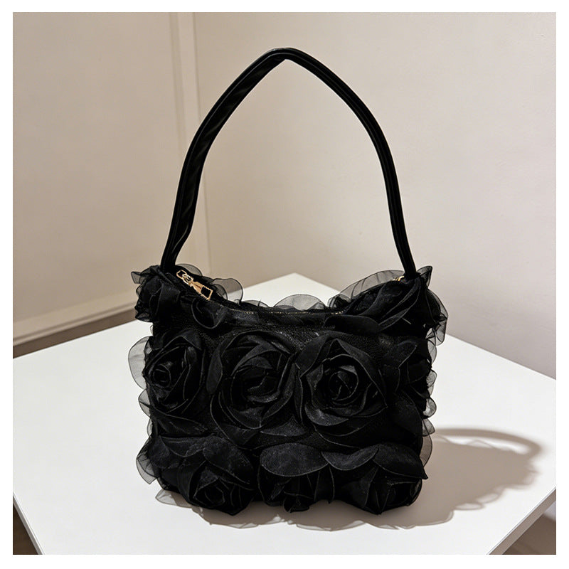 Sac bandoulière de soirée en dentelle rose