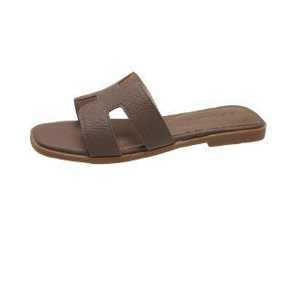 Sandales plates en forme de H pour la plage
