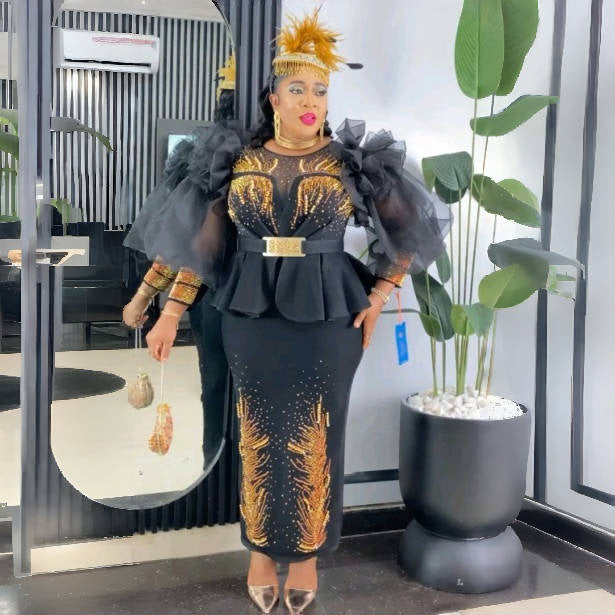 Robe amincissante de style africain à manches bouffantes