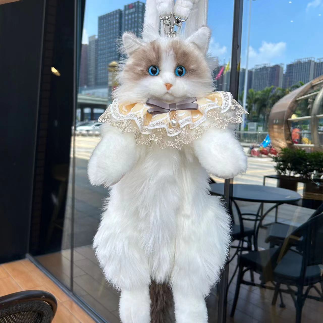Sac à dos poupée chat en peluche