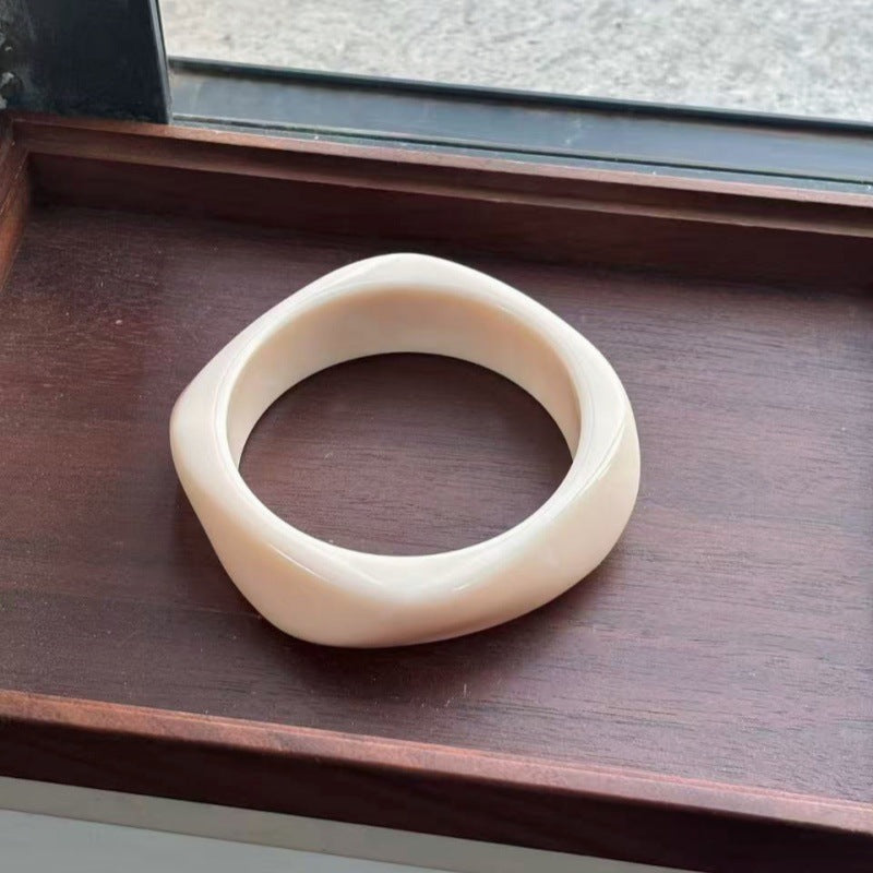 Bracelet géométrique irrégulier en résine pour femme