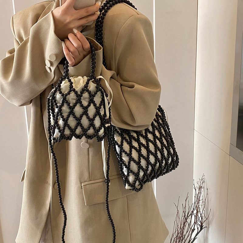 Sac à bandoulière tissé et perlé
