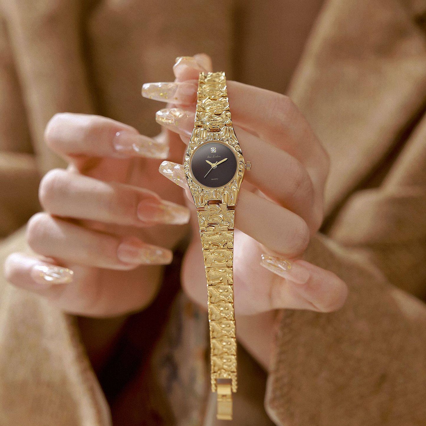 Montre quartz vintage pour femmes avec bracelet en alliage