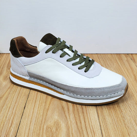 Chaussures décontractées pour hommes en cuir véritable, respirantes et confortables, à semelle plate.