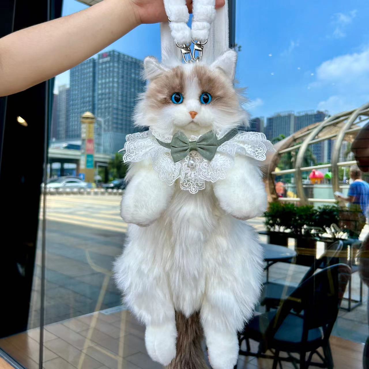 Sac à dos poupée chat en peluche