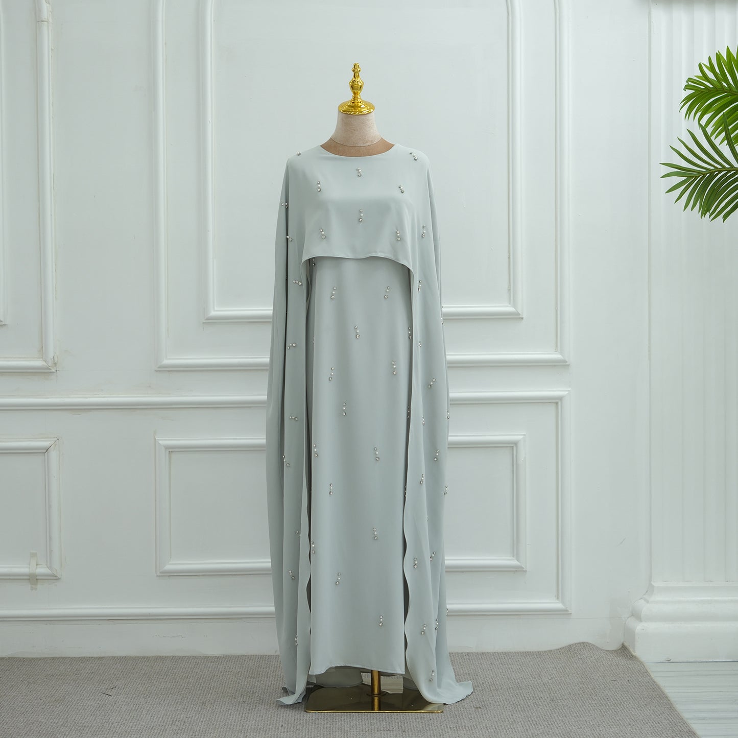 Robe élégante en deux pièces avec jupe évasée et perles