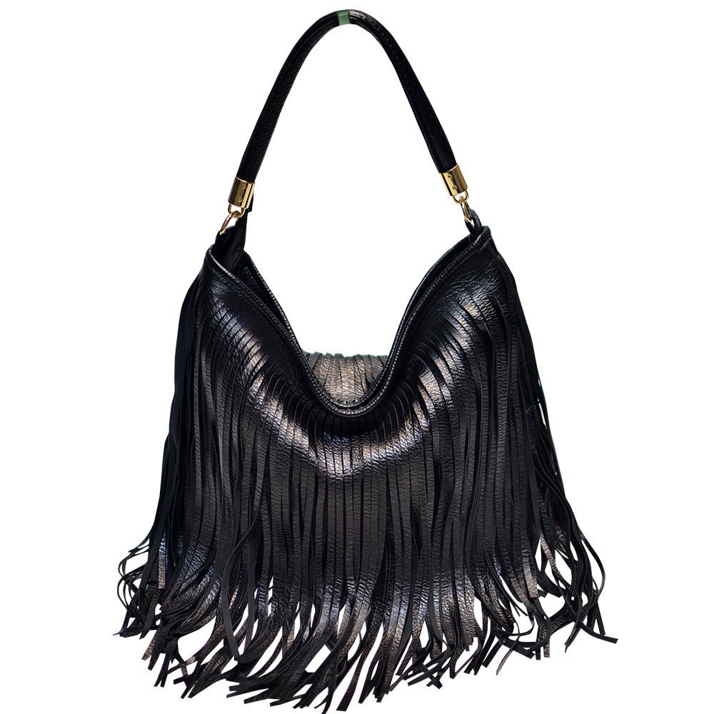 Sac bandoulière en cuir souple à double pompon