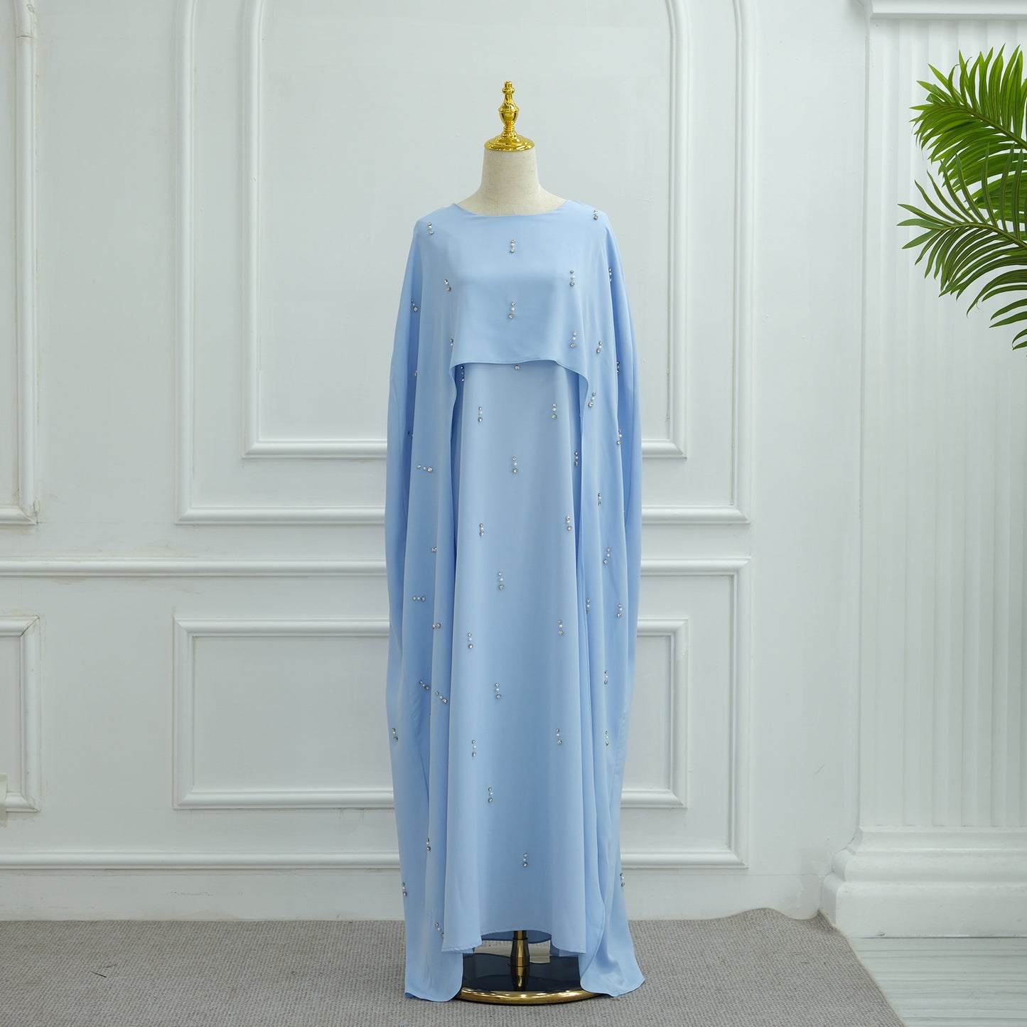 Robe élégante en deux pièces avec jupe évasée et perles