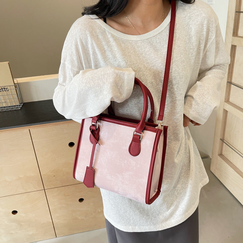 Sac à main en cuir tressé en forme de croissant