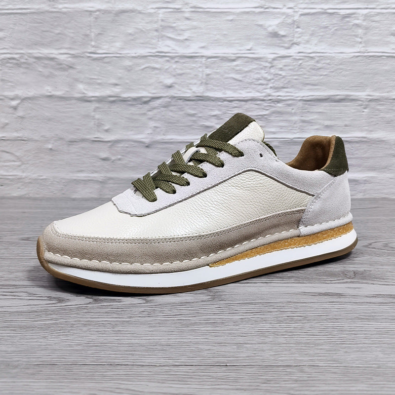 Chaussures décontractées pour hommes en cuir véritable, respirantes et confortables, à semelle plate.