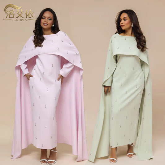 Robe élégante en deux pièces avec jupe évasée et perles