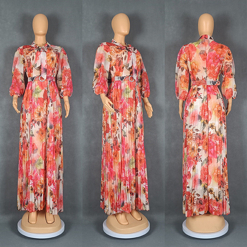 Habit :robe à col écharpe, manches bouffantes, imprimé à la taille, style affirmé