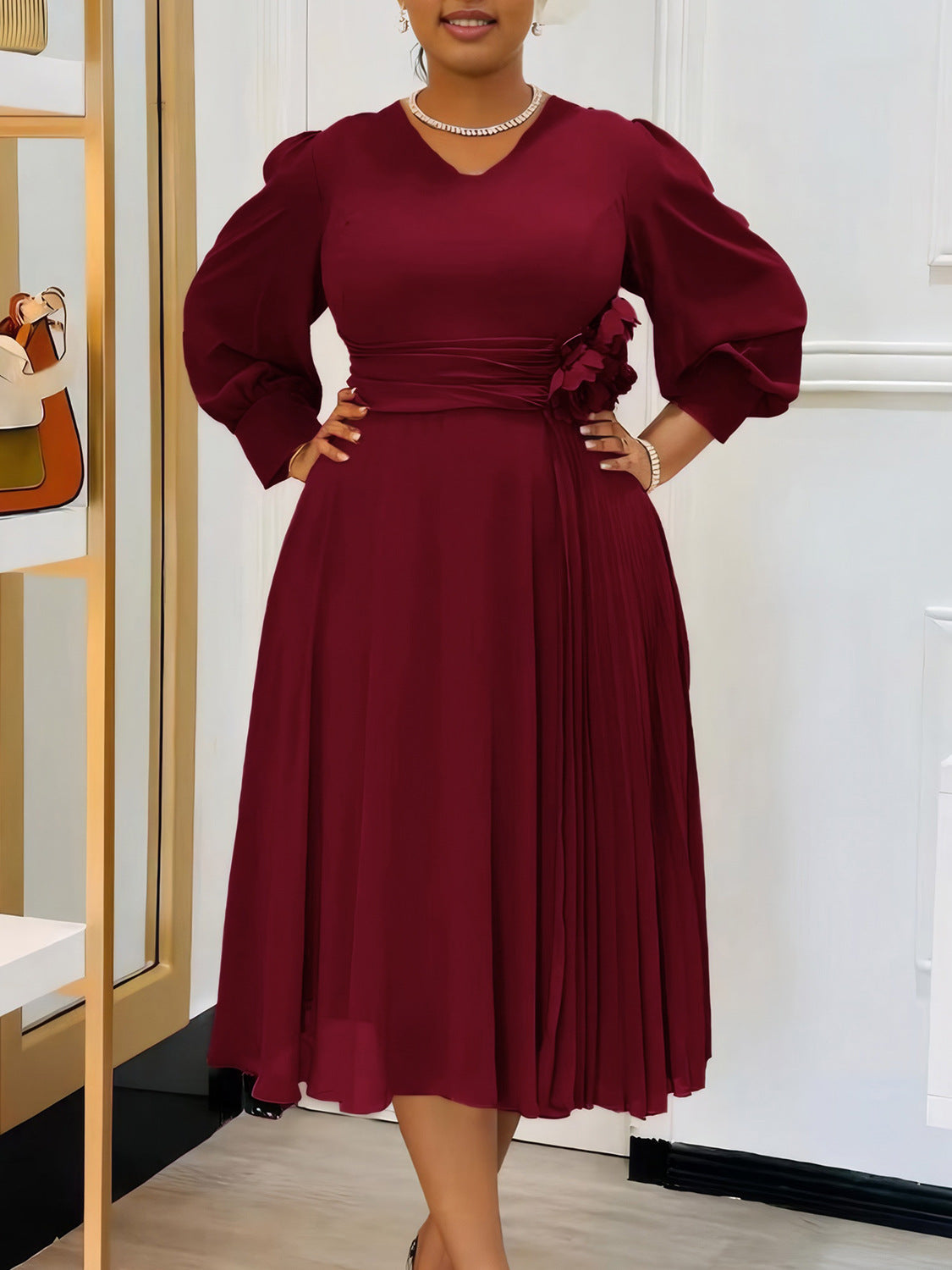 Habit :Robe midi élégante de coupe trapèze à manches lanternes