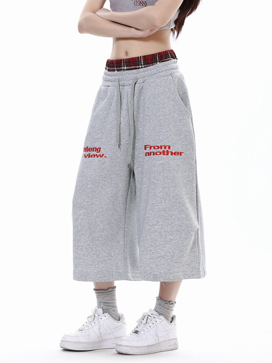Pantalon court décontracté à carreaux patchwork et double taille