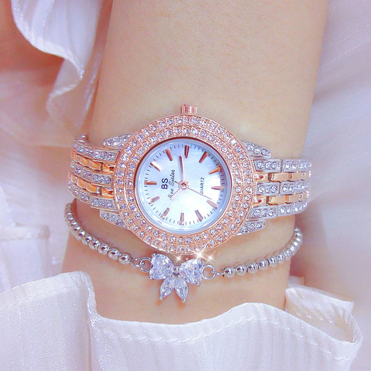 Montre de luxe pour femmes avec cadran en nacre et diamants