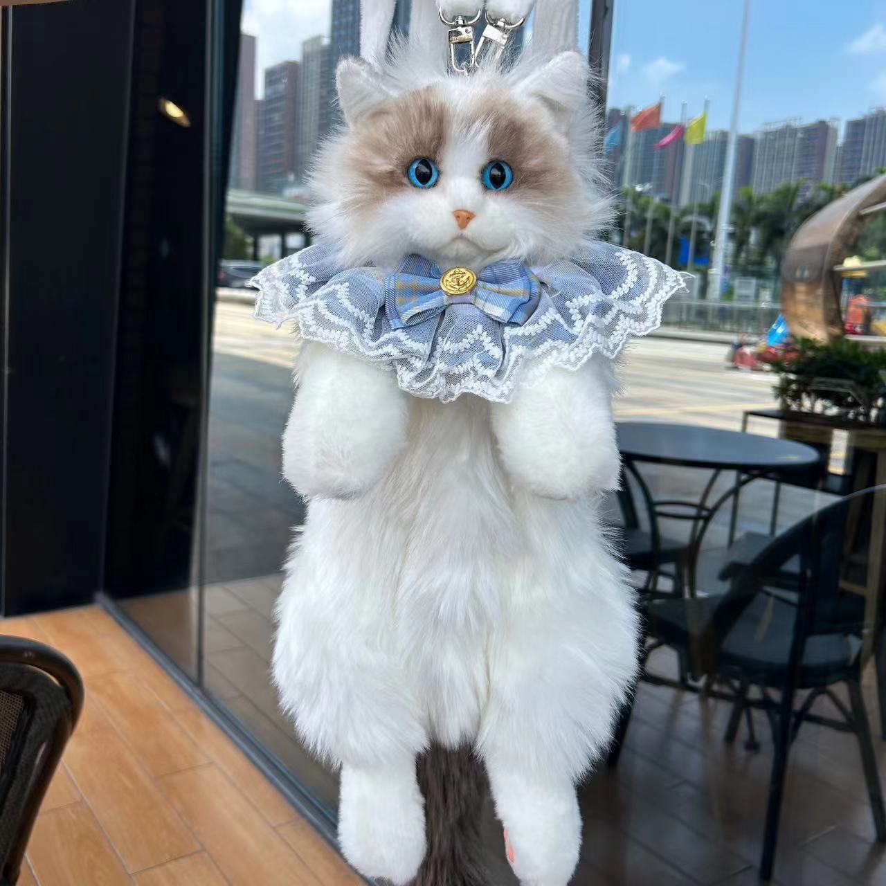 Sac à dos poupée chat en peluche