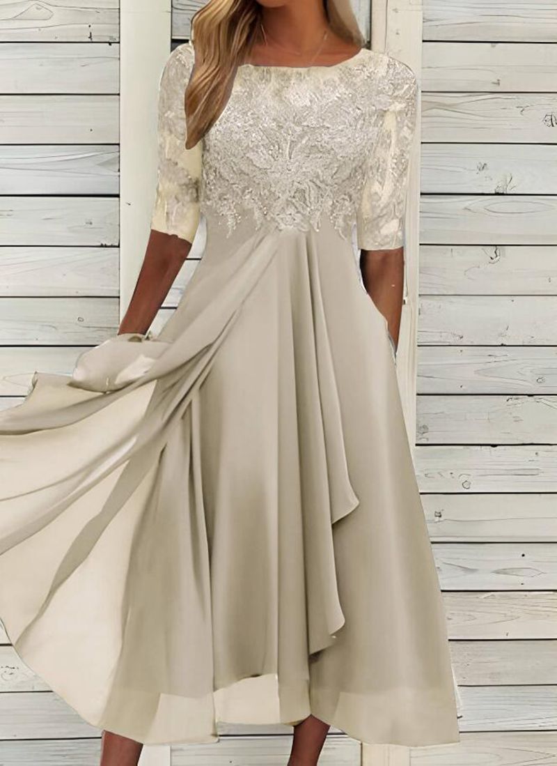 Robe élégante en dentelle en chiffon ajourée cousue