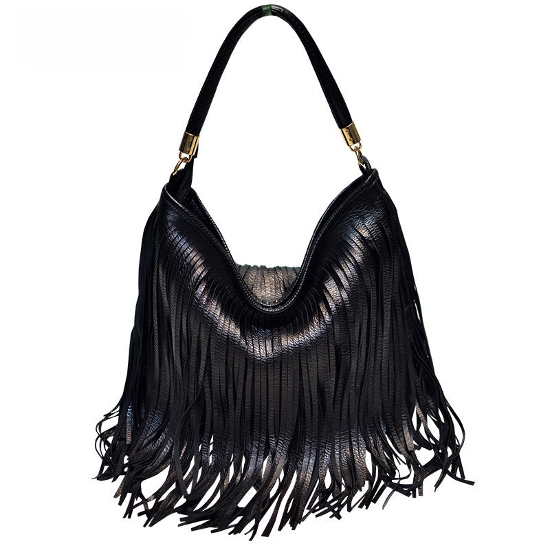 Sac bandoulière en cuir souple à double pompon