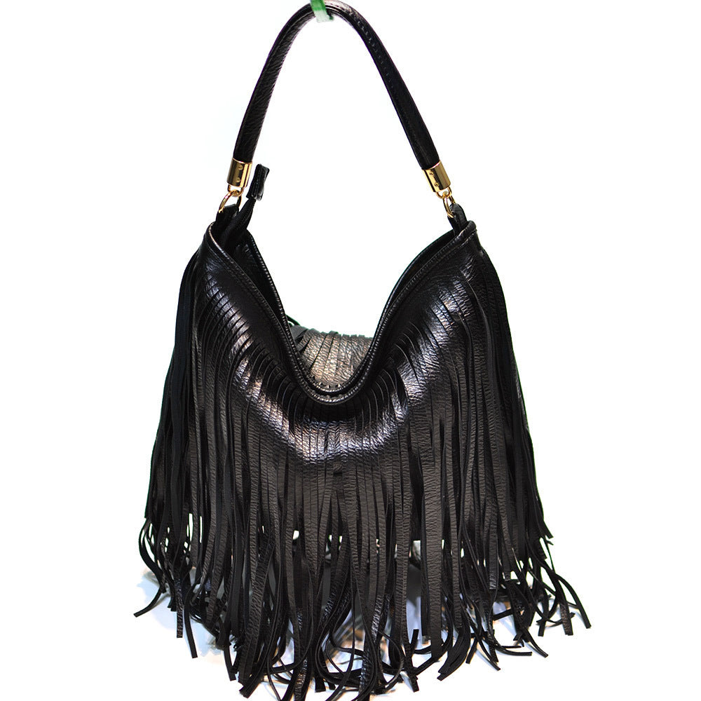 Sac bandoulière en cuir souple à double pompon