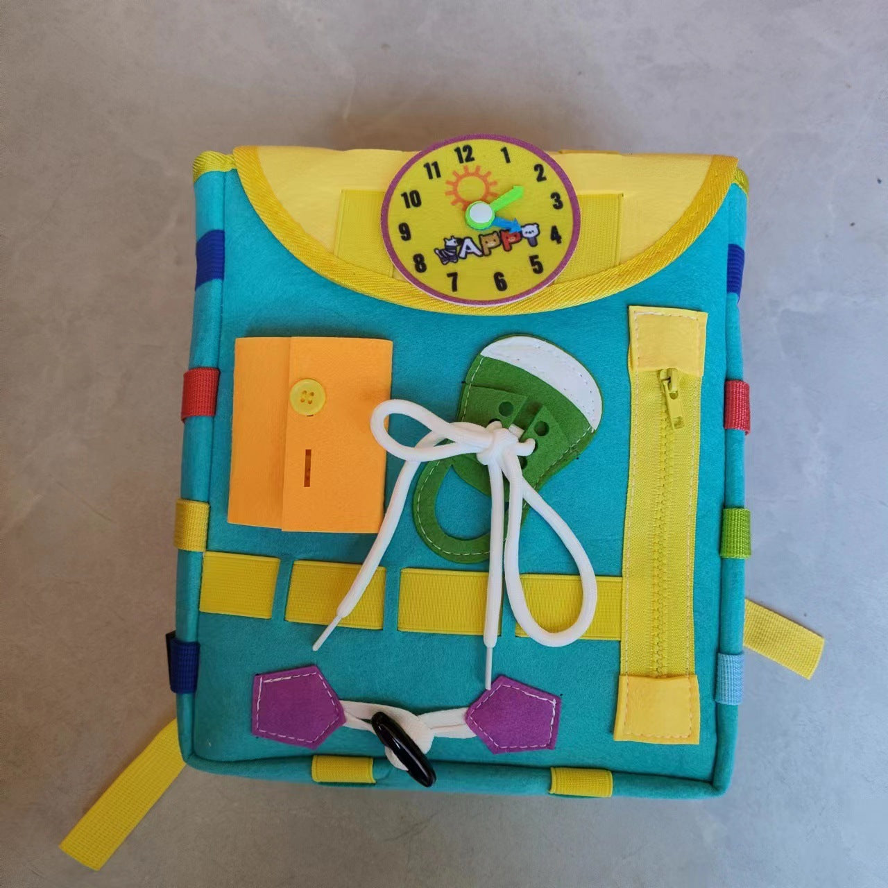 Sac à dos d'apprentissage avec panneau d'activités
